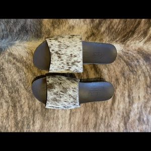 Cow hide platform sandals.